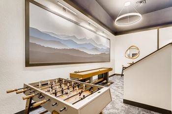 Cascade lounge with seating, foosball and shuffleboard